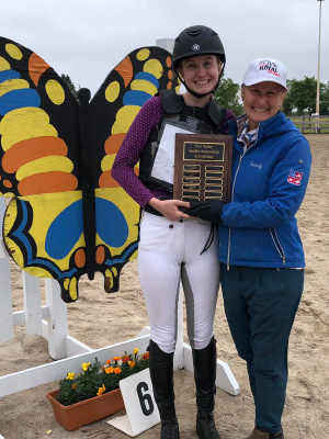 rider receiving an award