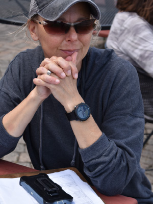 volunteer scorekeeper waiting on the patio